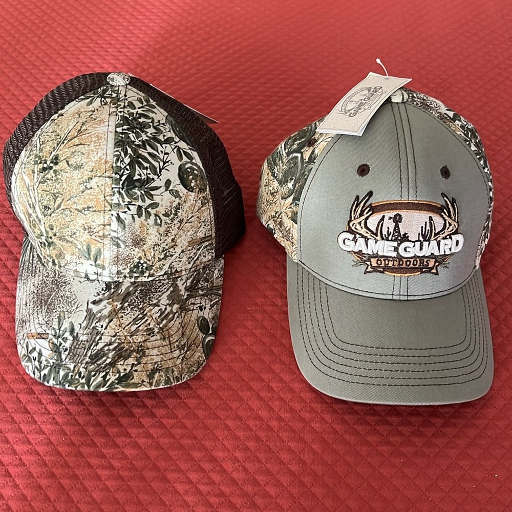 Two new with tags GameGaurd camo caps. MeshBack & Mesquite Game Guard Logo caps.